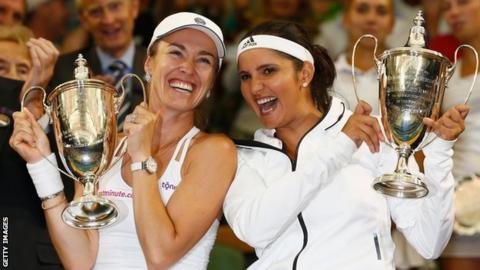 Martina Hingis and Sania Mirza celebrate winning the Wimbledon ladies' doubles title in 2015