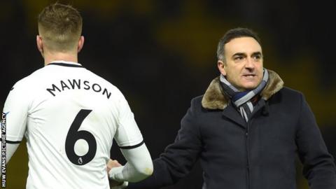 Alfie Mawson (left) with Carlos Carvalhal