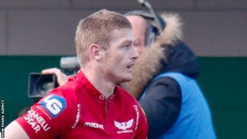 Scarlets full-back Johnny McNicholl is dejected after the error that led to Benetton's opening try