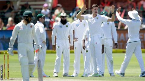 South Africa players celebrate a wicket against Zimbabwe
