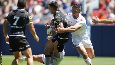Joseph Tapine of New Zealand is tackled by Sam Burgess of England during a Rugby League Test Match between England and the New Zealand Kiwis at Sports Authority Field at Mile High on June 23, 2018 in Denver, Colorado.