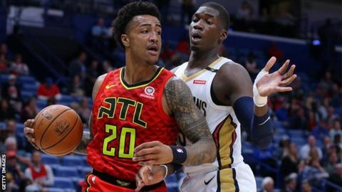 John Collins playing for Atlanta Hawks