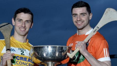 Antrim captain Simon McCrory with Shea Gaffney of Armagh
