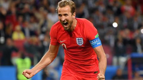 Harry Kane celebrates scoring for England