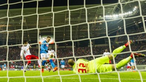 Piotr Zielinski scores Napoli's opening goal against RB Leipzig