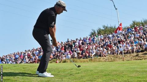 Darren Clarke plays a chip shot in Denmark on Friday