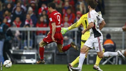 Bayern Munich's Robert Lewandowski scores against Ingolstadt