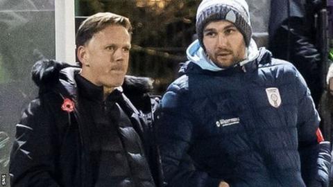 Glasgow City head coach Scott Booth (left) watches his side face Barcelona