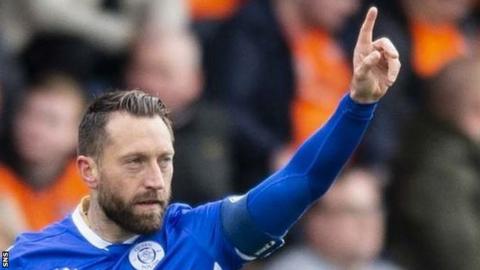 Queen of the South's Stephen Dobbie celebrates his opening goal against Dundee United at Palmerston Park