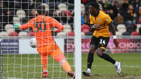 Adebayo Azeez of Newport County scores a goal