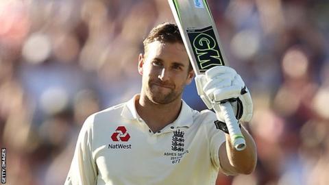 Dawid Malan raises his bat during the Ashes