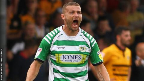 Carl Dickinson of Yeovil Town celebrates goal number six