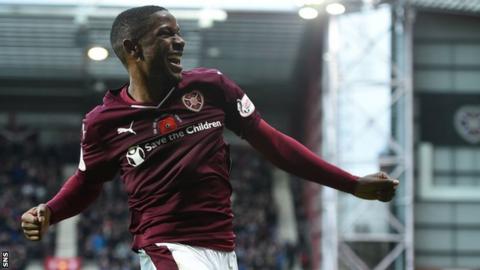 Arnaud Djoum celebrates scoring for Hearts