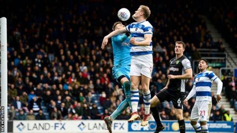 Matt Smith of QPR scores with a header 2-1
