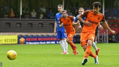 Scott Fraser scores a penalty