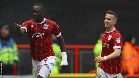 Famara Diedihou celebrates opening the scoring for Bristol City