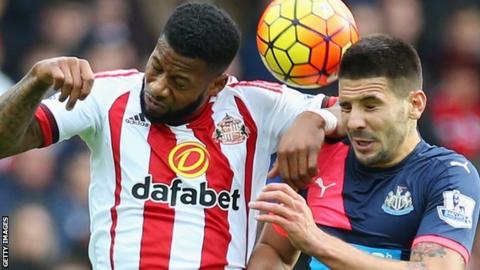 Jeremain Lens goes up for a header against Newcastle