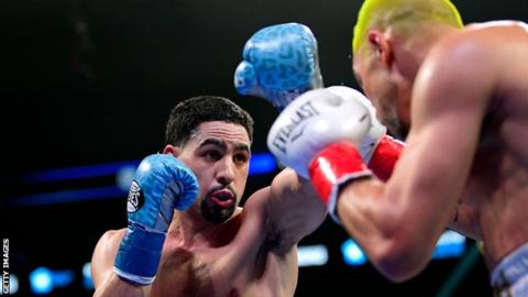 Danny Garcia and Ivan Redkach in the ring