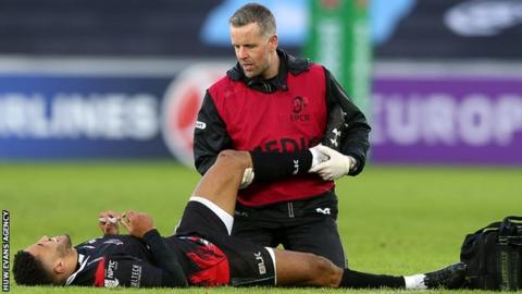Keelan Giles is treated on the field