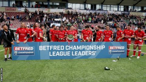 Toronto celebrate their League Leaders' Shield win in the Championship