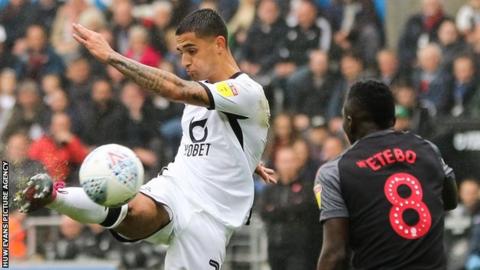 Yan Dhanda takes a shot for Swansea City