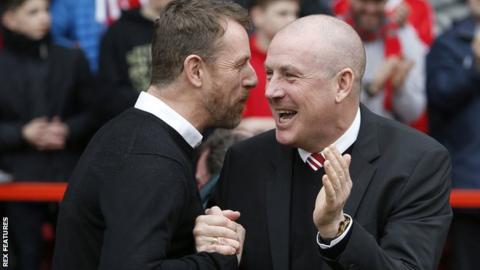 Gary Rowett (left) in his first match in charge of derby shakes hands with Mark Warburton, who took charge of Nottingham Forest for the first time