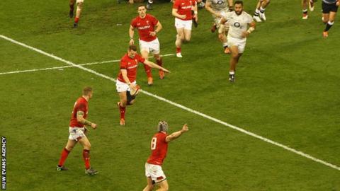 Dan Biggar prepares to kick the ball in the build-up to Wales' decisive second try against England