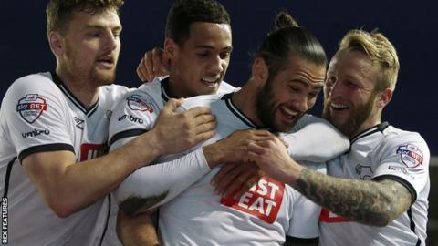 Derby County players celebrate a Bradley Johnson goal against Hull