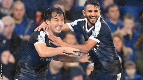 Shinji Okazaki and Riyad Mahrez celebrate Leicester's third goal