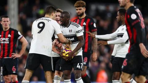 Aboubakar Kamara argues with Aleksandar Mitrovic
