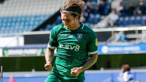 Josh Windass celebrates Sheffield Wednesday's second goal