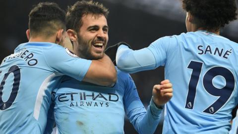 Manchester City players celebrate