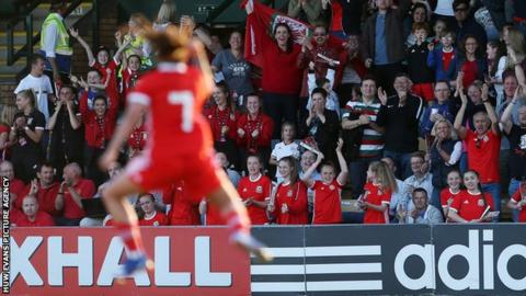 Tash Harding celebrates in front of crowd