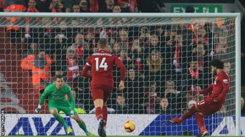 Liverpool's Mohamed Salah scores a penalty against Newcastle