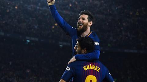 Lionel Messi and Luis Suarez