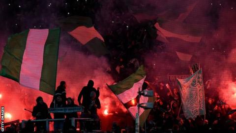 Saint-Etienne fans let off flares