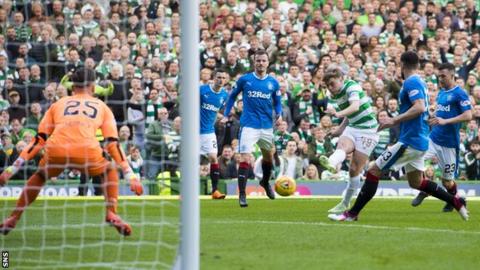 Celtic winger James Forrest scores against Rangers