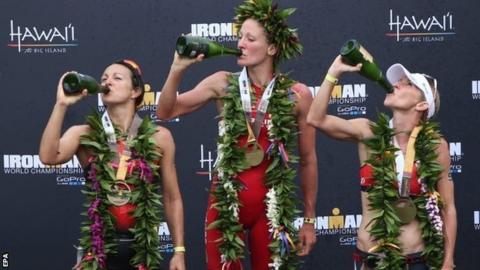 The top three women celebrate - Rachel Joyce (second) Daniela Ryf (first) and Liz Blatchford (third)