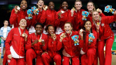 England celebrate beating Australia in the Commonwealth Games netball final
