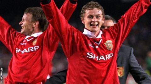Teddy Sheringham and Ole Gunnar Solskjaer after the 1999 Champions League Cup final