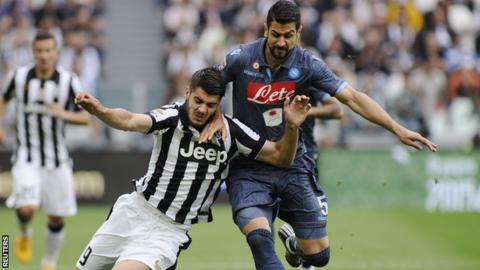 Ex-Napoli Miguel Britos tackles Alvaro Morata of Juventus