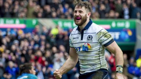Tommy Seymour celebrates after scoring against Italy