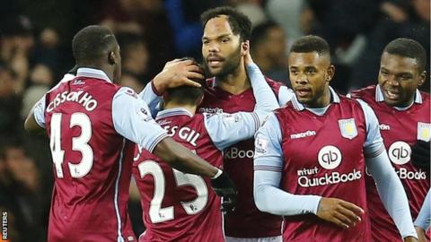 Aston Villa players celebrate taking the lead against Crystal Palace