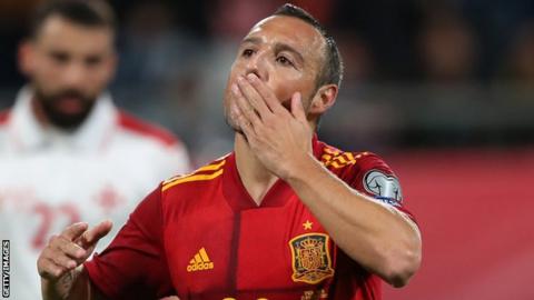 Santi Cazorla celebrates scoring for Spain