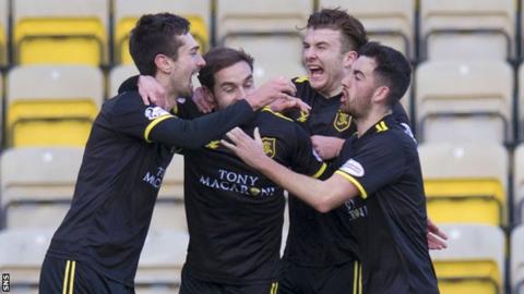 Livingston's Ryan Hardie (left) celebrates his second goal