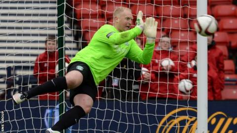 Conrad Logan stopped two penalties in the shootout at Hampden