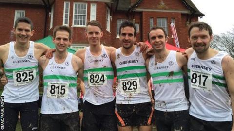 Individual champion Lee Merrien (left) with Guernsey's winning men's team