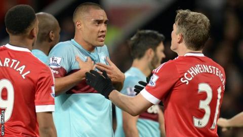 Bastian Schweinsteiger and Winston Reid