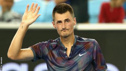 Bernard Tomic waving to the crowd