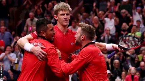 Kevin Anderson is congratulated by team-mates Nick Kyrgios and Jack Sock